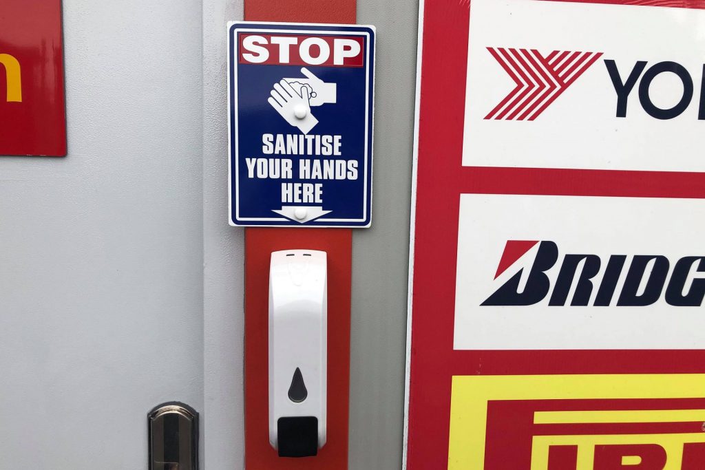 Hand sanitizer station outside the reception of R and K Garage